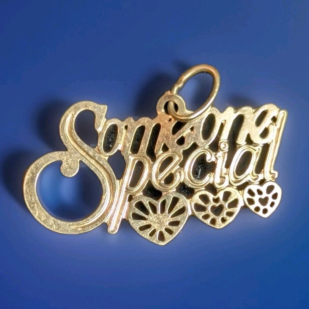 14k Gold ‘Someone Special’ Charm With Three Hearts .31g Total Weight
